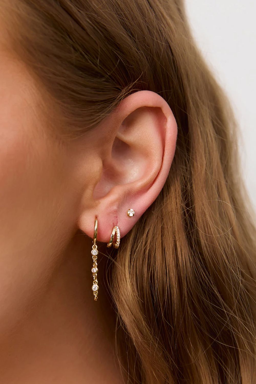 Arms of Eve Winnie Gold Huggie Earrings